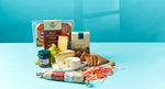 A red gift box incorporating local cheese and charcuterie items from Northern Ireland 